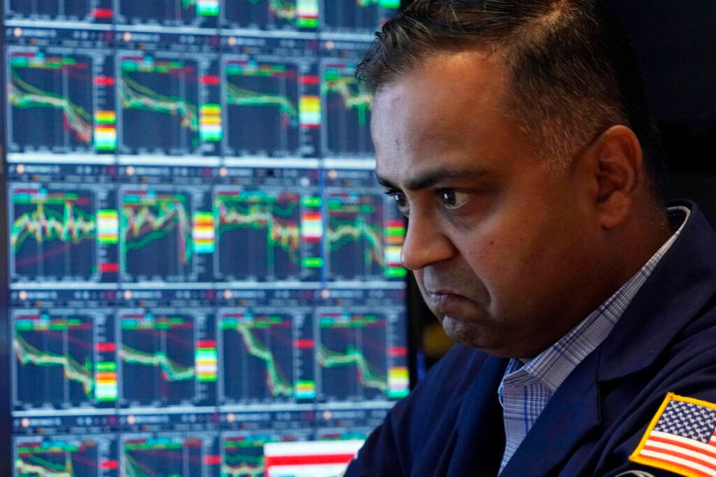 Japan’s share benchmark soars nearly 11% a day after massive sell-offs that shook Wall Street