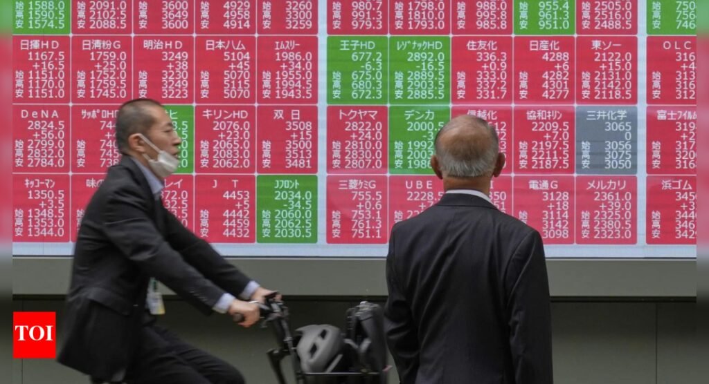 Asian shares edge lower as US markets closed for Memorial Day