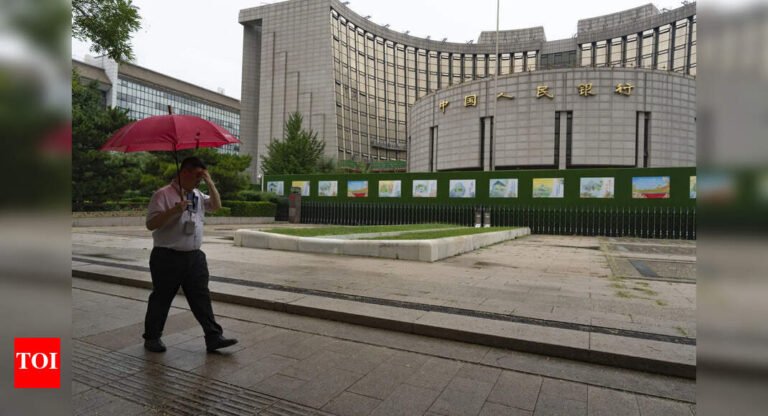 China’s central bank cut interest rates to record lows to revive grappling economy